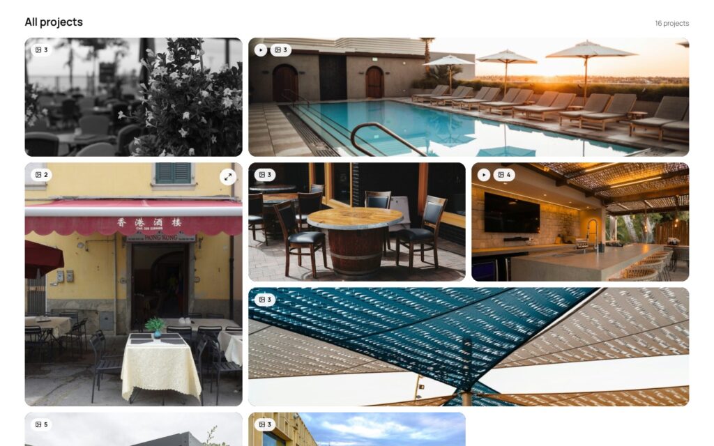 Grid layout with wide and tall tiles: sixteen projects with photos, each with a small card showing product, industry, name and place, a photo count and a play symbol on projects with a video.